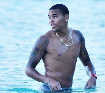  script tattoo across his chest Checkout these pictures of Chris Brown 