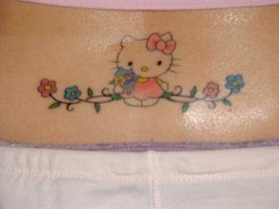 This cute lower back tattoo is perfect for a girly girl who wants something