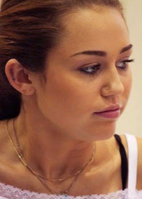 Miley Cyrus Latest on Cyrus New Ear Tattoo Design   Find The Latest News On Miley Cyrus New