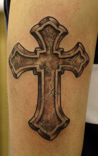 cross tattoos for men on chest. In addition, people prefer to have tattoos on his arms and chest, 
